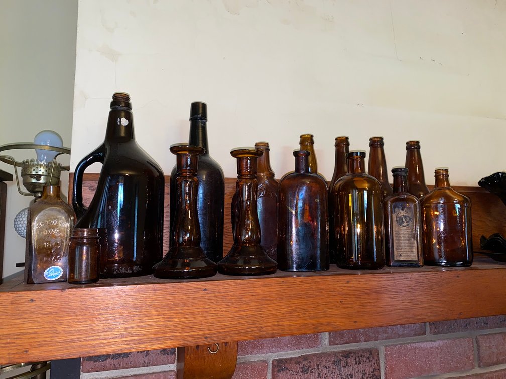 Amber Colored bottles and Candle Sticks Holders