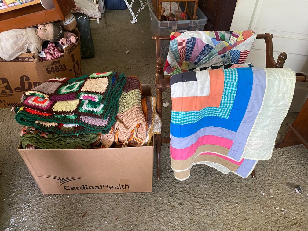 Quilt Rack with quilts and Crocheted Blankets