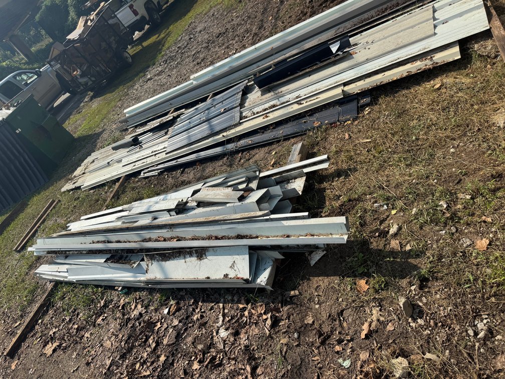 Metal building trim and tracks