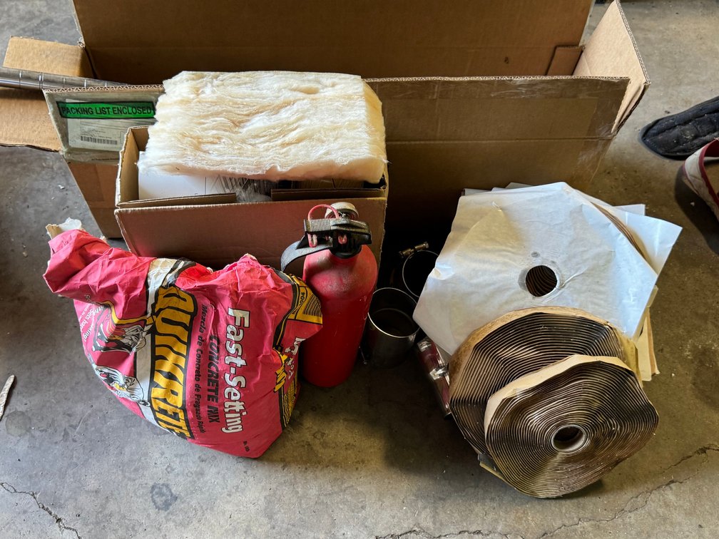 Anchors, concrete mix and fire extinguisher