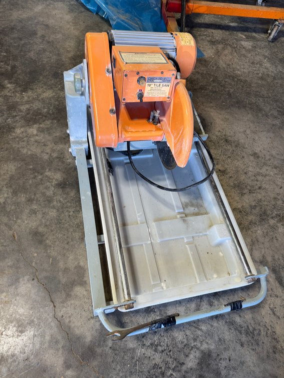 Orange and Grey Chicago Electric Tin wet Tile saw