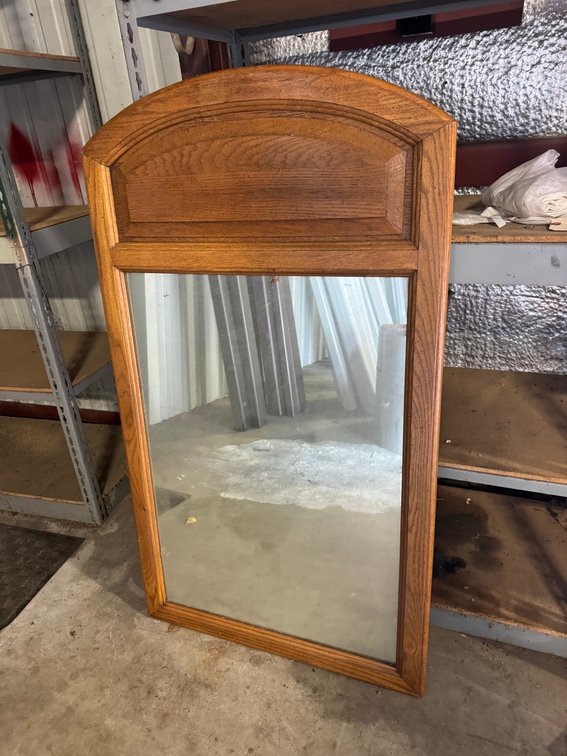 Wood-framed wall mirror