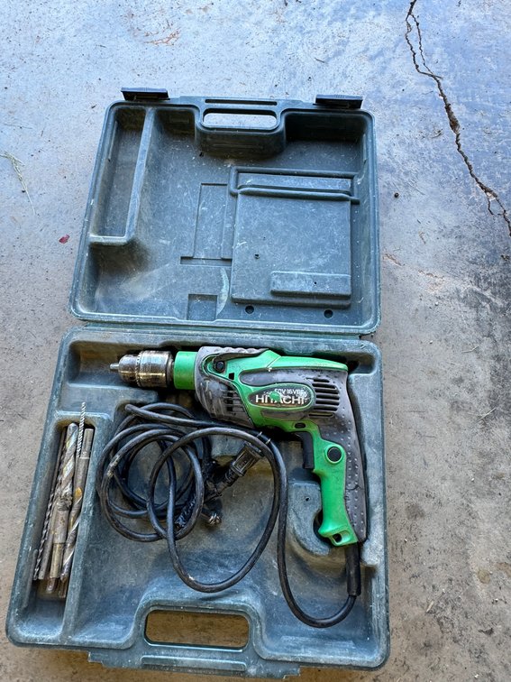 Green and black Hitachi FDB 2 5/8 inch 5 AMP Corded Hammer Drill