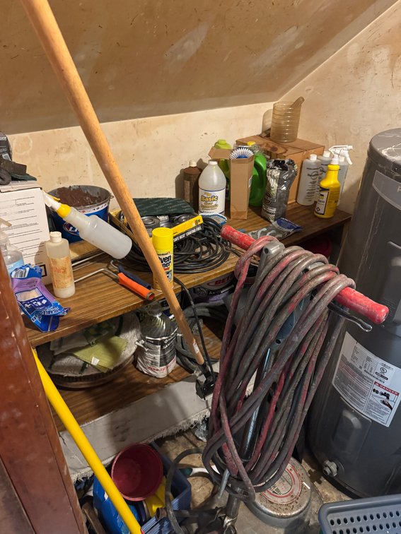 Closet Contents Including Floor Maintainer
