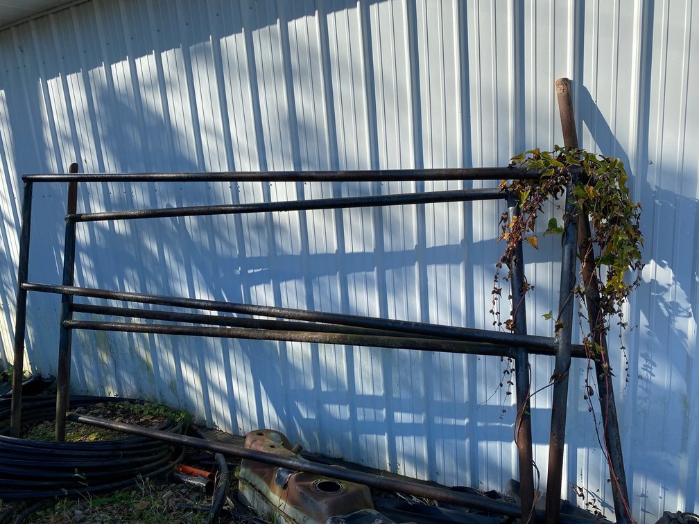 Black piping-approx. 10' long x 4' high