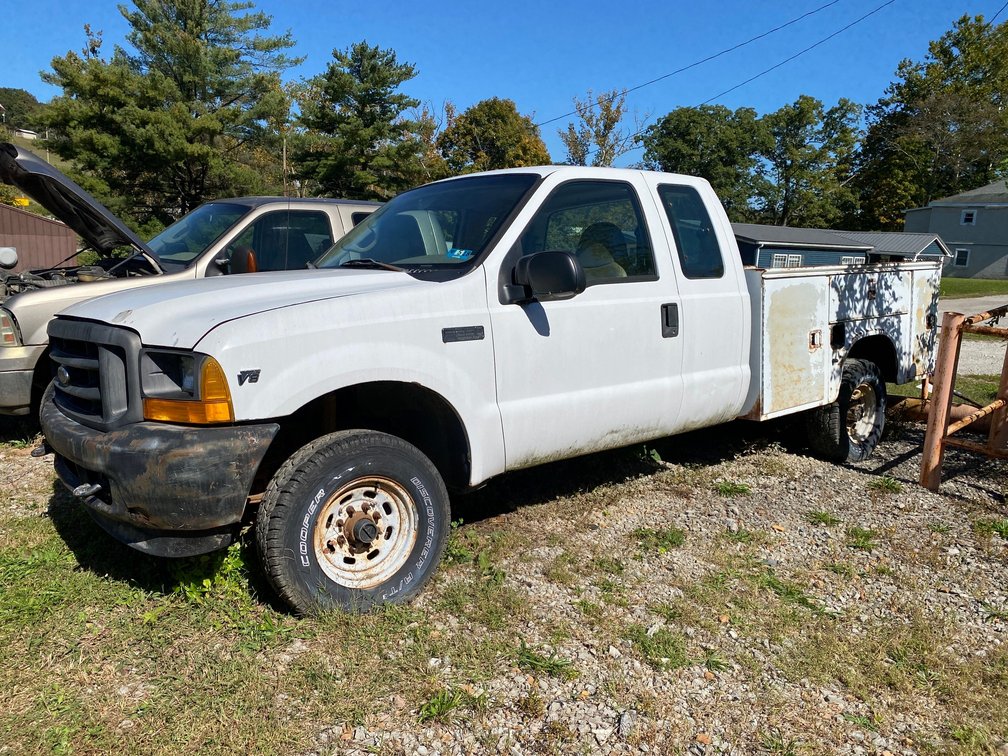 2001 Ford F250, V8 Triton, 4 wheel drive, extended cab, work utility bed