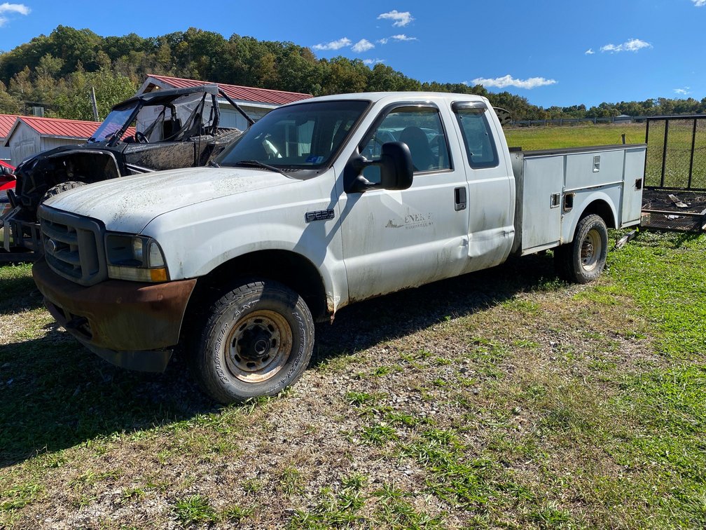2003 Ford F250, 5.4 Triton motor, 4 wheel drive, extended cab, utility bed
