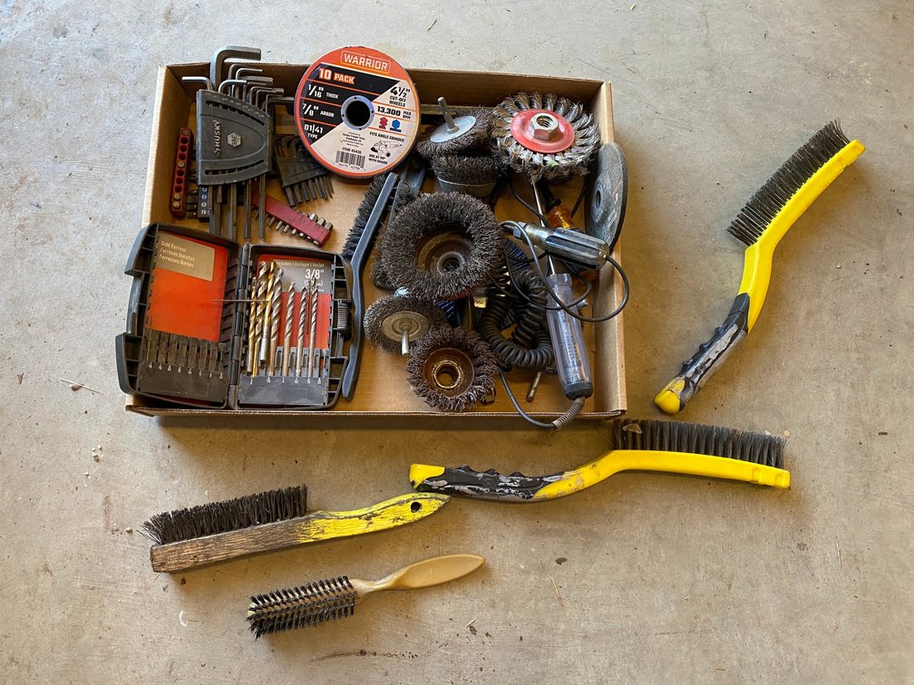 Wire brushes, drill bits, allen wrenches, scraper