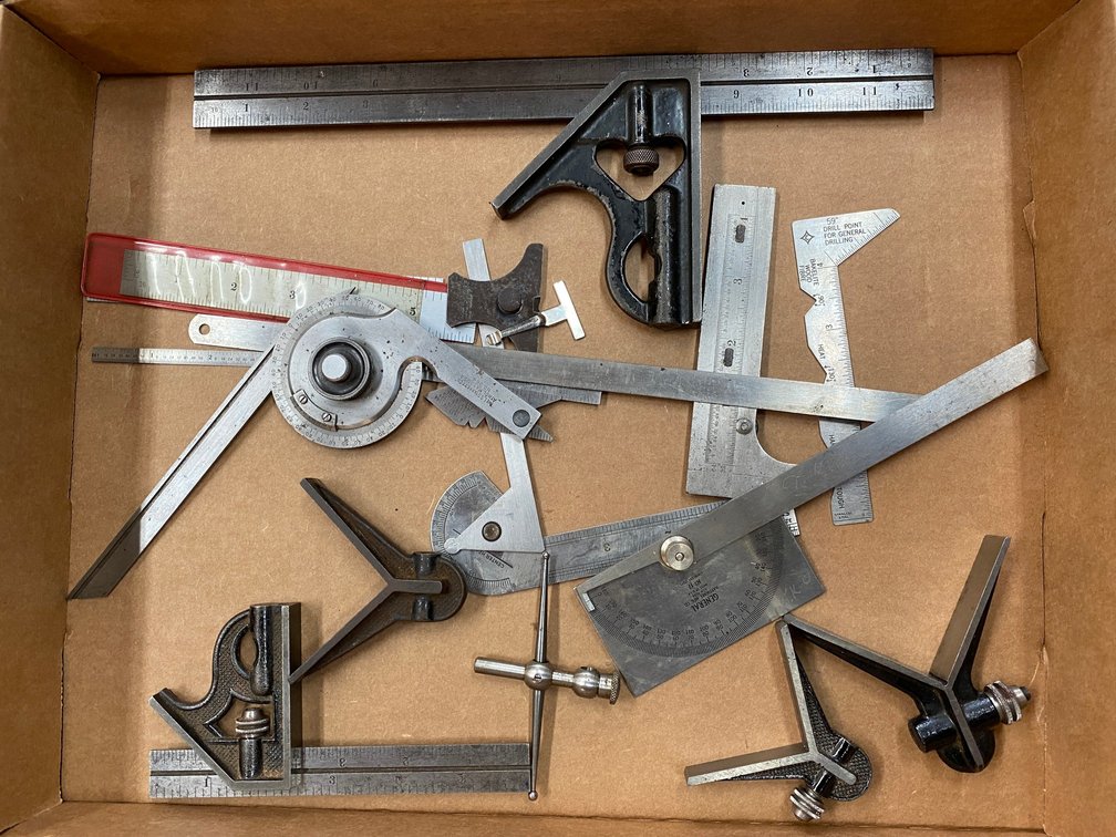 Lot of compasses, scales, squares