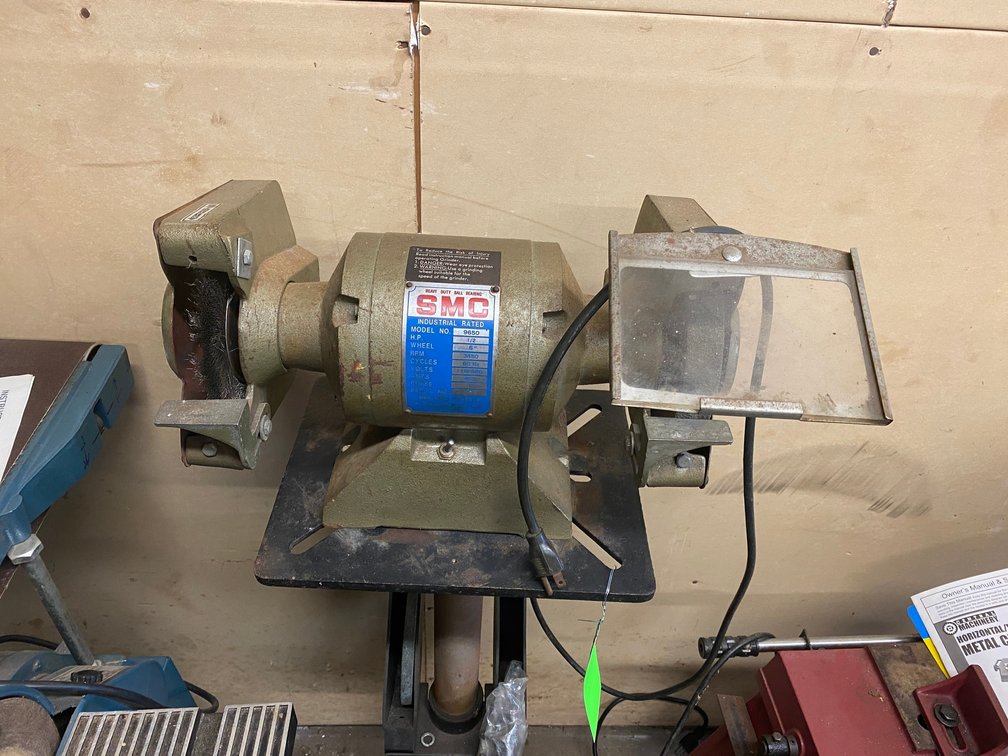 SMC grinder on pedestal stand