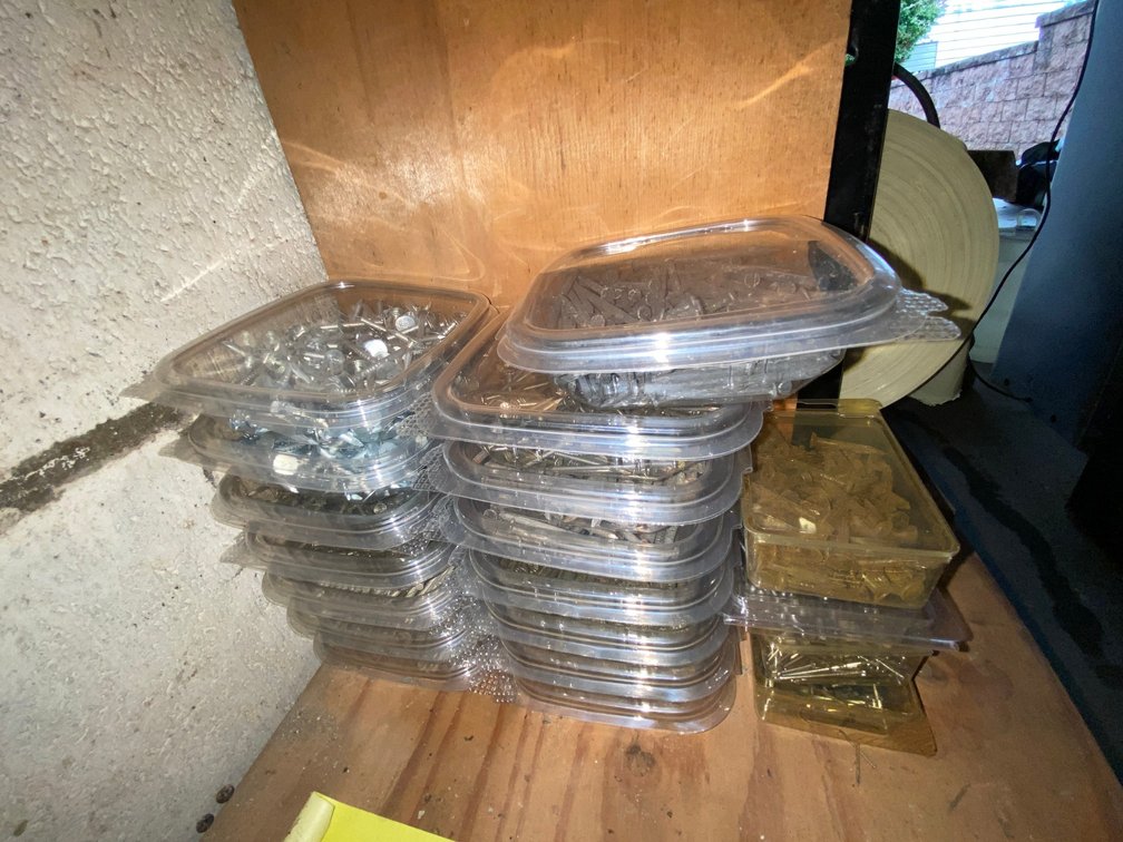 Nails, Screws, and Fasteners in Plastic Containers