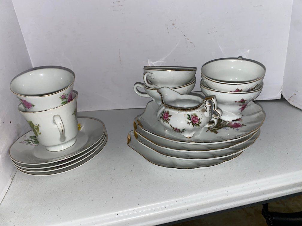 Porcelain Teacups, Saucers, Plates, and Creamer