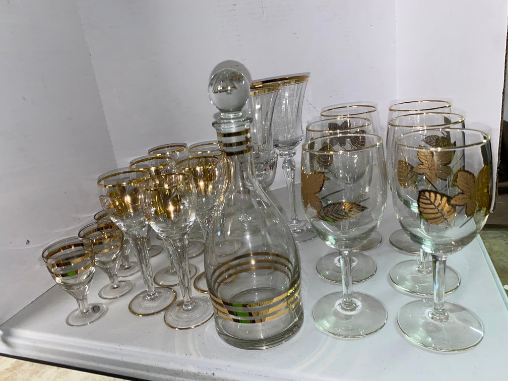 Glass Decanter and Gold-Decorated Stemware