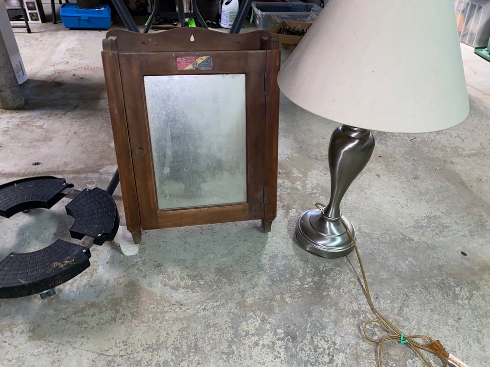 Wooden Mirrored Cabinet, Brushed Metal Table Lamp, Rolling Caddy