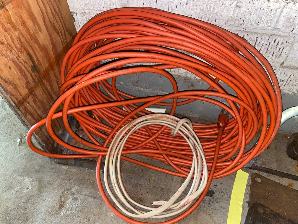 Orange Extension Cord and Electrical Wire