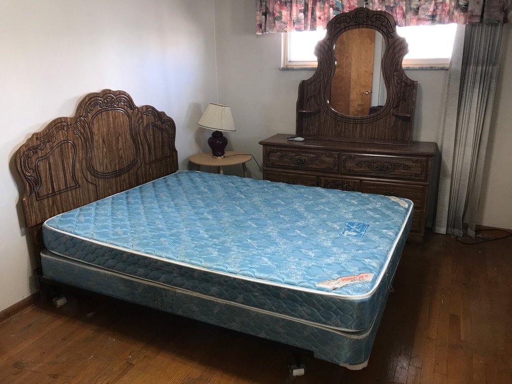Queen size bed and dresser with mirror-58" x 75", lamp stand, ironing board, clothes hamper