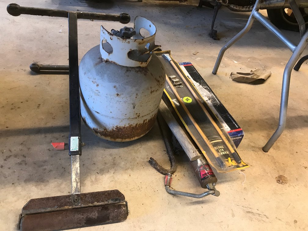 Propane tank, roller, crowbar, pick, marker kit