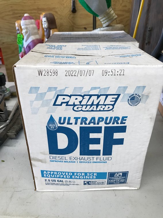 Two 2 1/2 gallon jugs of Def diesel exhaust fluid