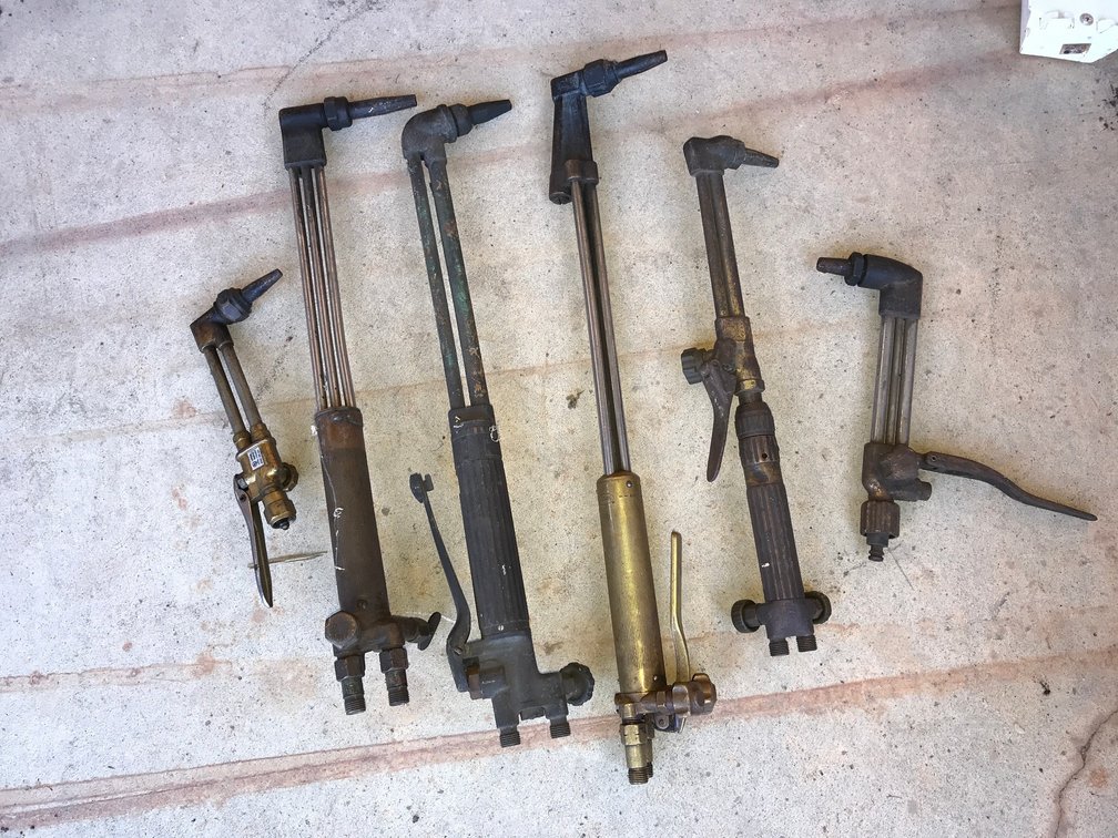 Group of oxygen acetylene torches and torch heads