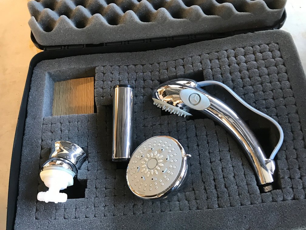 Showe heads and accessories in hard case