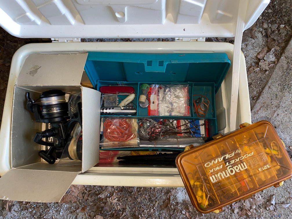 Cooler with Fishing Reel, Tackle, and Accessories