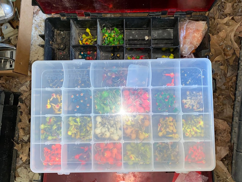 Tackle Box with Fishing Jig Heads and Soft Baits