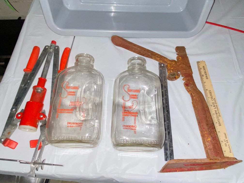 Glass Milk Bottles, Bottle Corker, Tools, and Utility Tub