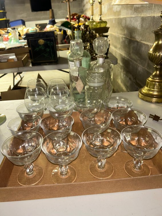 Clear glass champagne and bottles