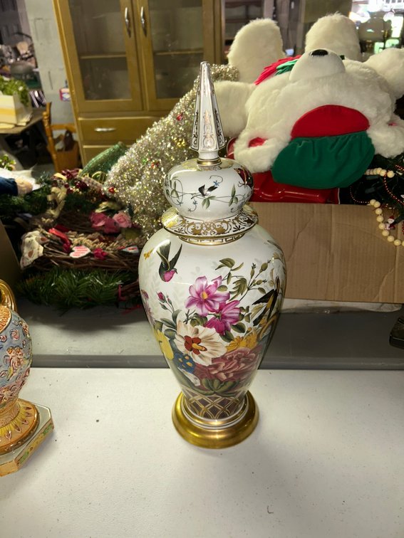 Floral decorated with gold trim urn with lid