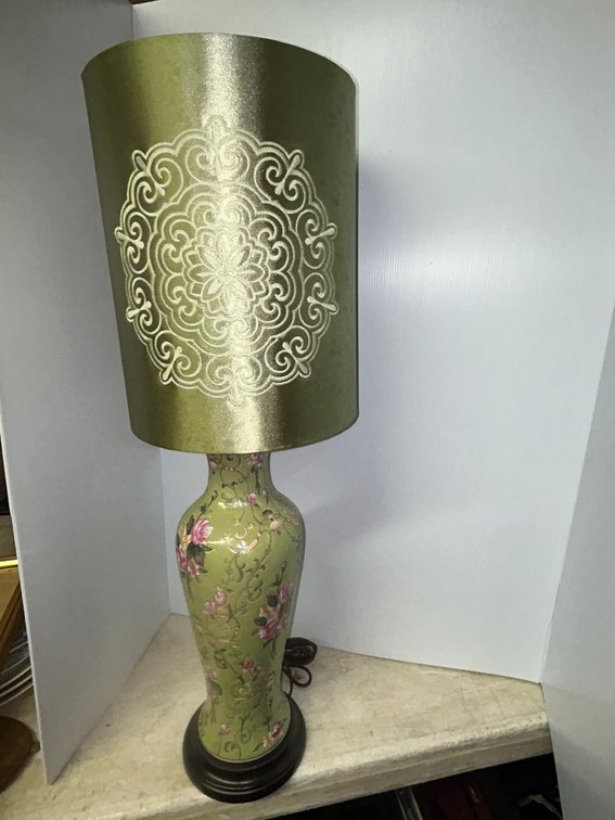 Green table lamp with floral design