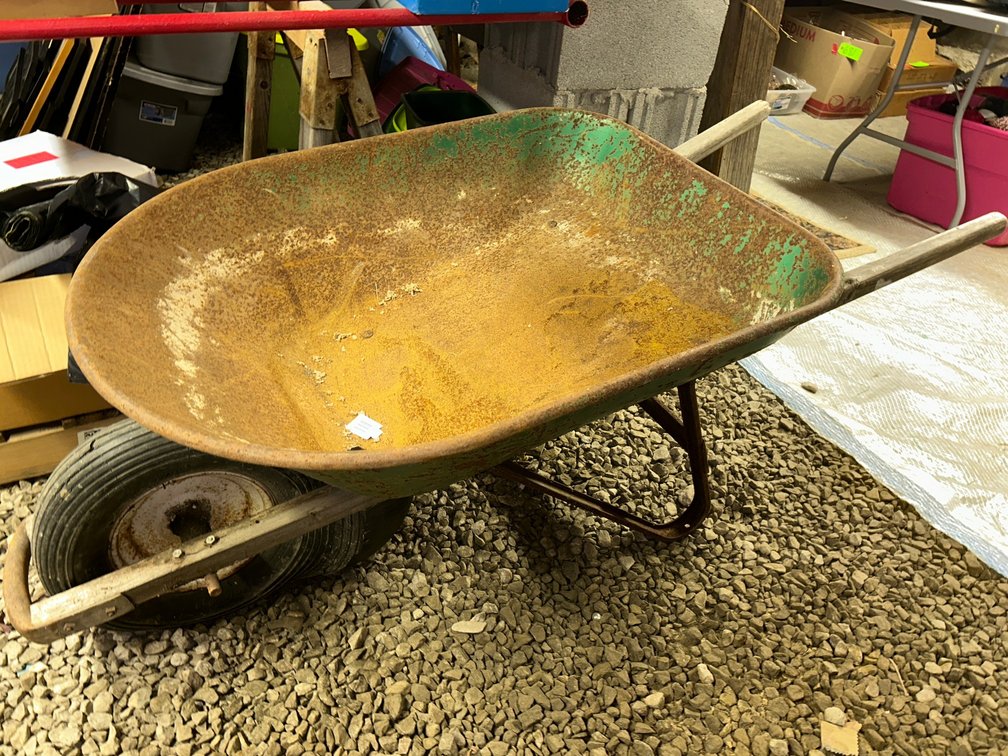 Wheelbarrow**front tire is damaged**