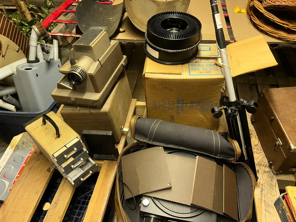 Lot of slide projectors, storage cases