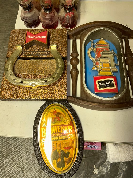 Advertising signs for Budweiser and Black Label