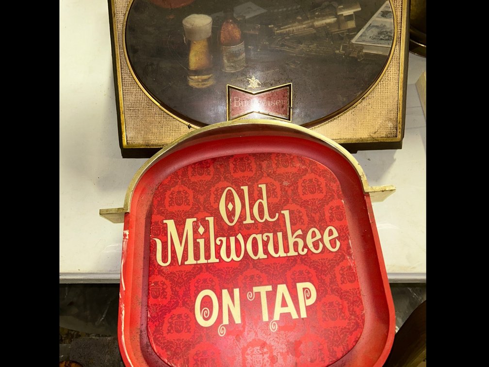 Old Milwaukee advertising sign, Budweiser advertising sign**with damage**