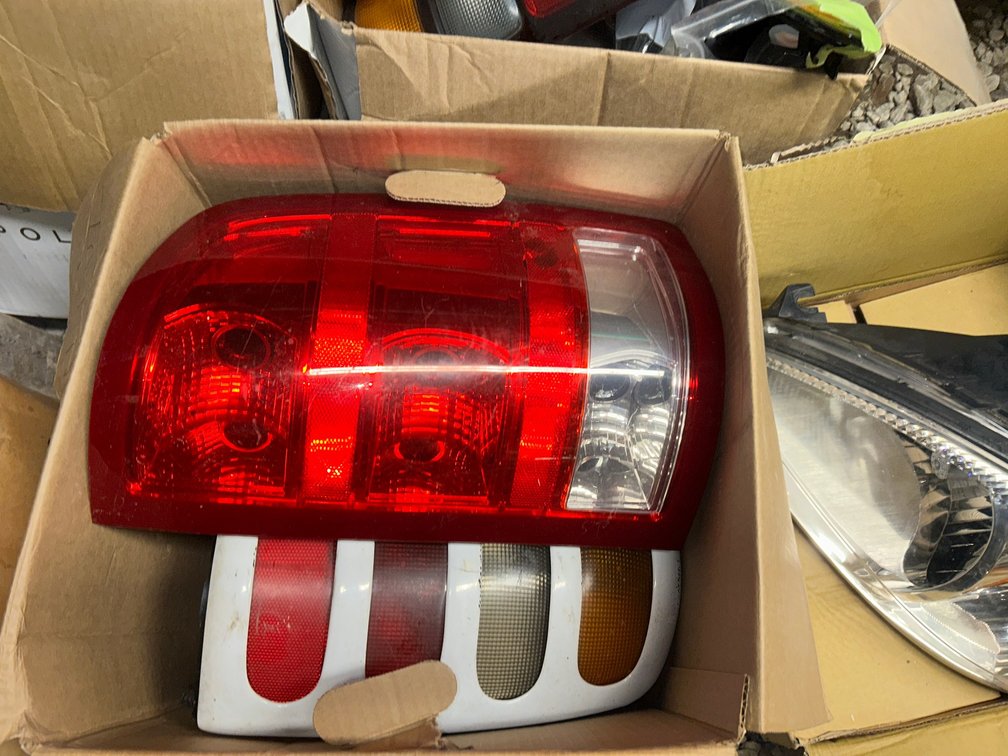 Lot of random car parts, rear lights