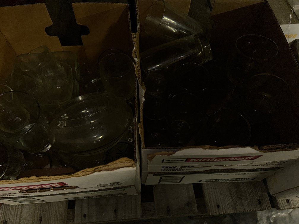 Collection of clear glass mugs and glasses