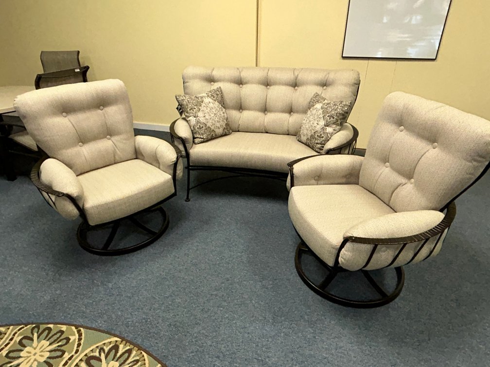 Patio furniture-OW Lee Mini Monterra crescent love seat and 2 swivel rocker lounge chairs with 2 pillows