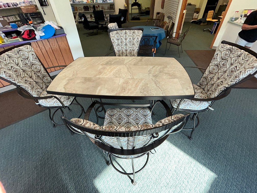 OW Lee count height table with 4 Monterra swivel counter chairs