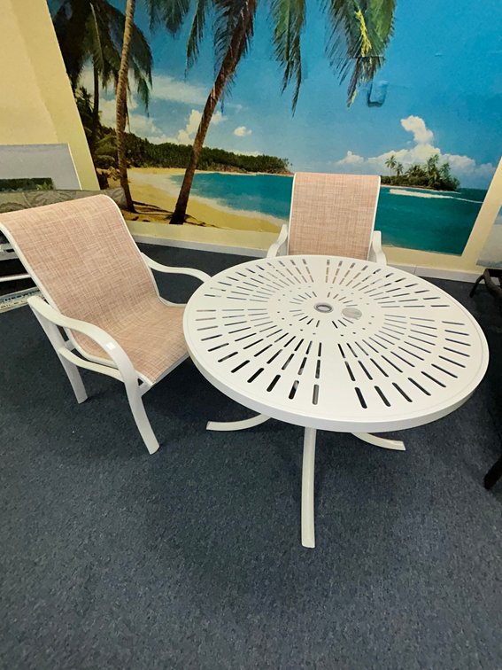 2 Tropitone Shoreline sliding dining chairs and 36" round Estrada dining table-#1836SLU
