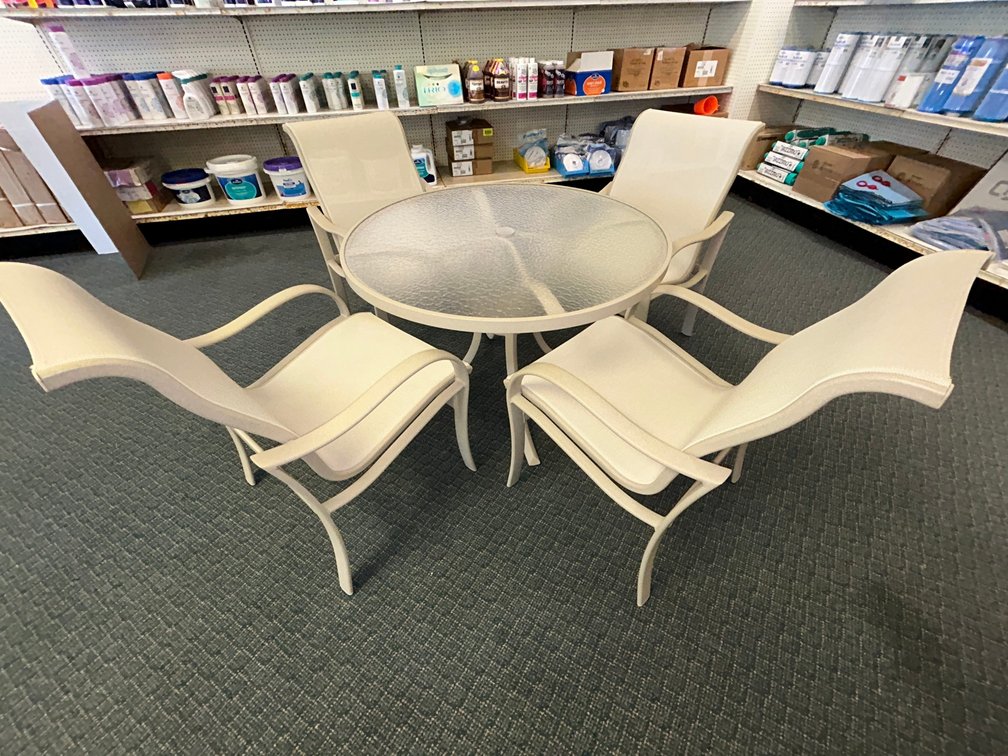 4 Tropitone Shoreline sling dining chairs-model #960237, with 42" acrylic table