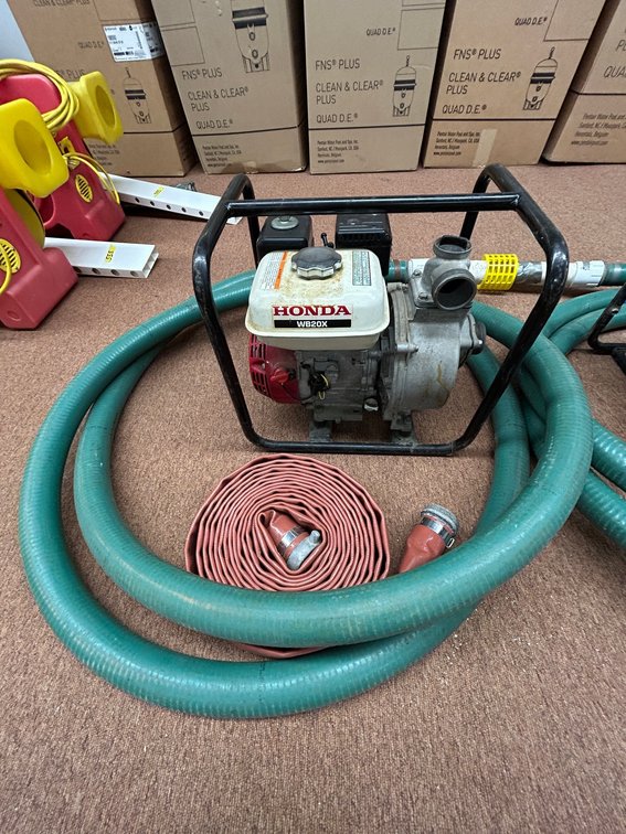 Honda WB20X gasoline powered trash pump with suction and discharge lines-used and does work