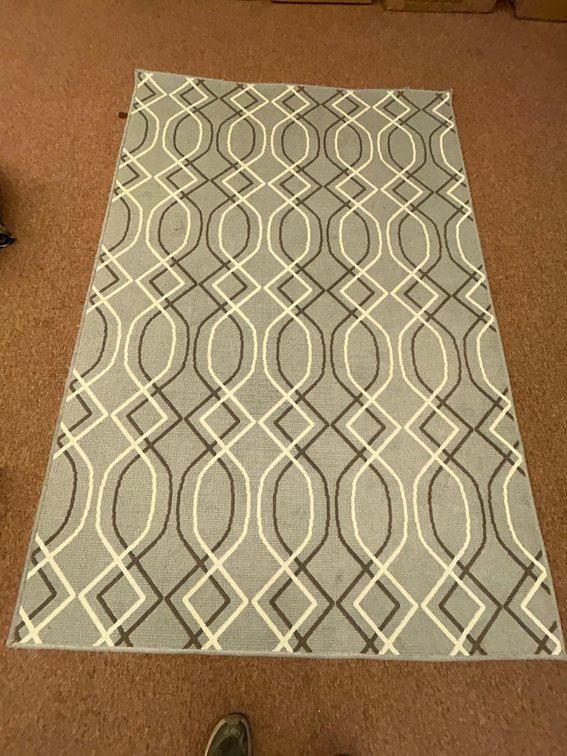 Oriental Weavers rug, 5'3" x 7'6" rectangular gray outdoor rug-some marks