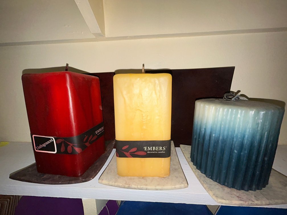 Misc. candles-2 Ceylon 4" light tone bases, 1 Ceylon 4" dark tone base, 2 Embers candles, 1 Zimbali pillars, misc. Embers, Eucalyptus, 2 Kobe candle bases