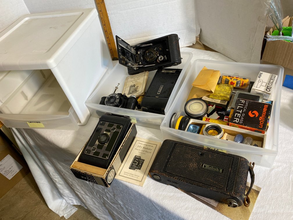 Vintage cameras-3 are Kodak, a Jiffy Kodak, a Falcon mini-camera, and accessories