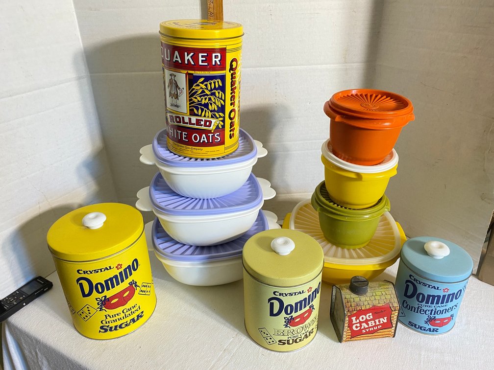 Tupperware bowls, tin Domino Sugar canisters, Quaker Oats tin, Log Cabin Syrup bank