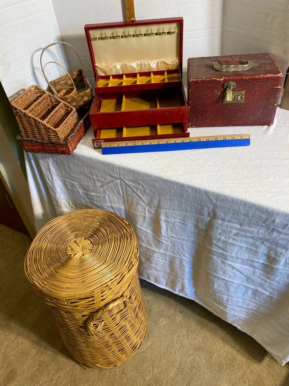 Wicker style laundry basket, empty jewelry box, other boxes and baskets