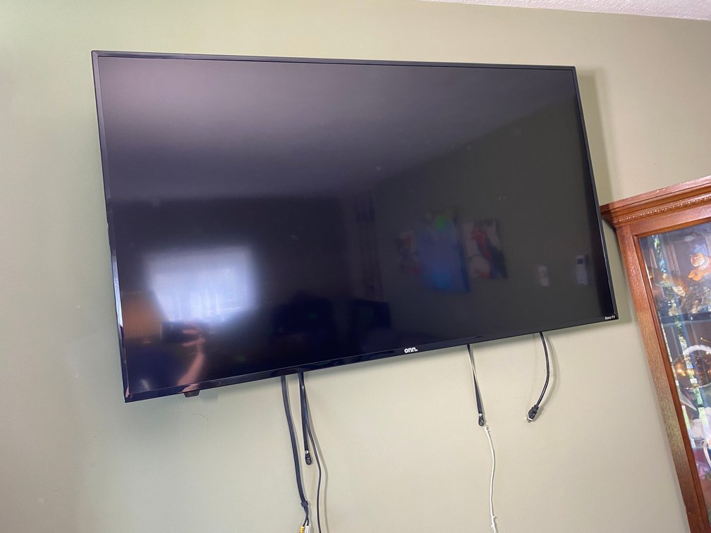 Onn. Wall mounted flatscreen TV-49"-no remote