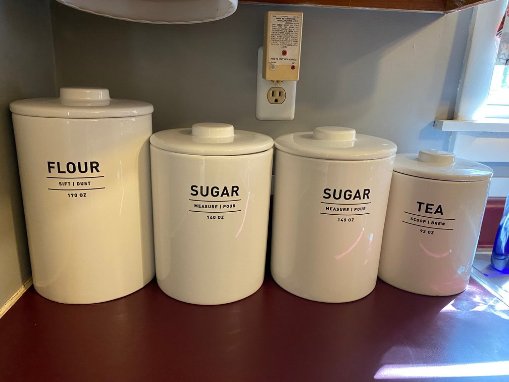 4 Canister set from West Elm-1 for tea, 2 for sugar, 1 for flour