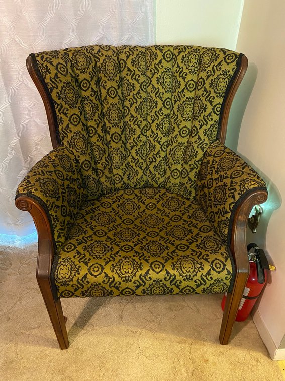 Upholstered chair**does have fraying and wear**