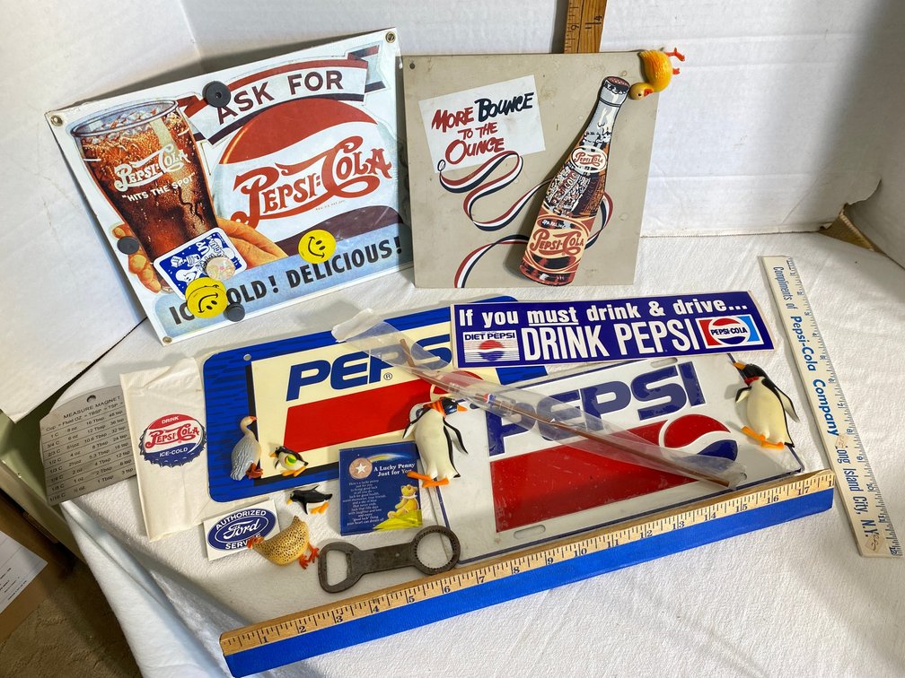 Pepsi-Cola collectibles-one is porcelain sign made by Andy Rooney, license plates, bumper stickers